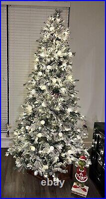GE 7.5-ft Candlewood Pine Pre-lit Flocked Artificial Christmas Tree + Storage