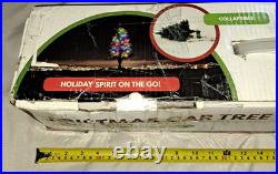 Light Up Christmas Car Tree attaches to automobile rooftop open box