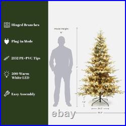 LuxenHome 7-ft Pre-lit Flocked Artificial Christmas Tree with Green LED Lights