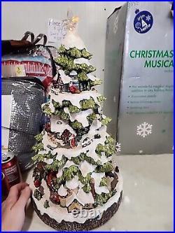 MUSICAL LIGHTED CHRISTMAS TREE WITH ROTATING TRAIN HOLIDAY FIGURINE 19in