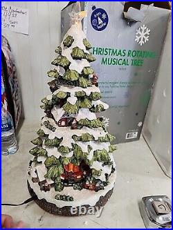 MUSICAL LIGHTED CHRISTMAS TREE WITH ROTATING TRAIN HOLIDAY FIGURINE 19in