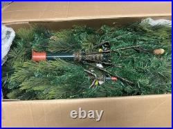 National Tree Company 12 ft. Pre-Lit Carolina Pine Slim Tree with Clear Lights