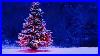 Snowfall_On_Brightly_Lit_Christmas_Tree_Video_U0026_Music_01_xagk